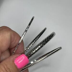 bracelets silver tone set of four coordinating fashion costume jewelry